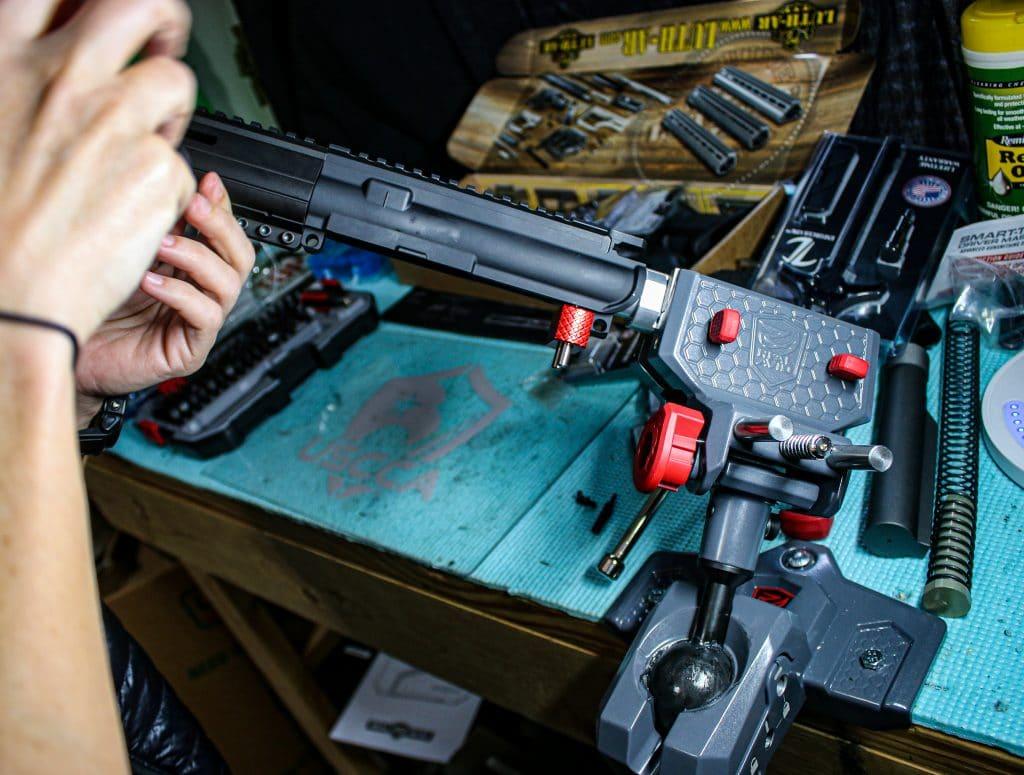 The Master Gun Vise rotates on a ball with 360 degree of movement, enabling to position it at any angle. If you are serious about building or working on rifles and plan to do so often, this vise saves time and removes almost all of the headaches.