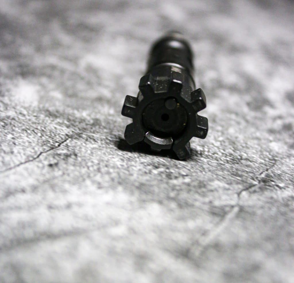 The cog-like locking lugs locks it into place in the firing chamber.