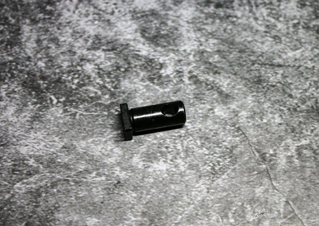 The cam pin connects the bolt and firing pin.