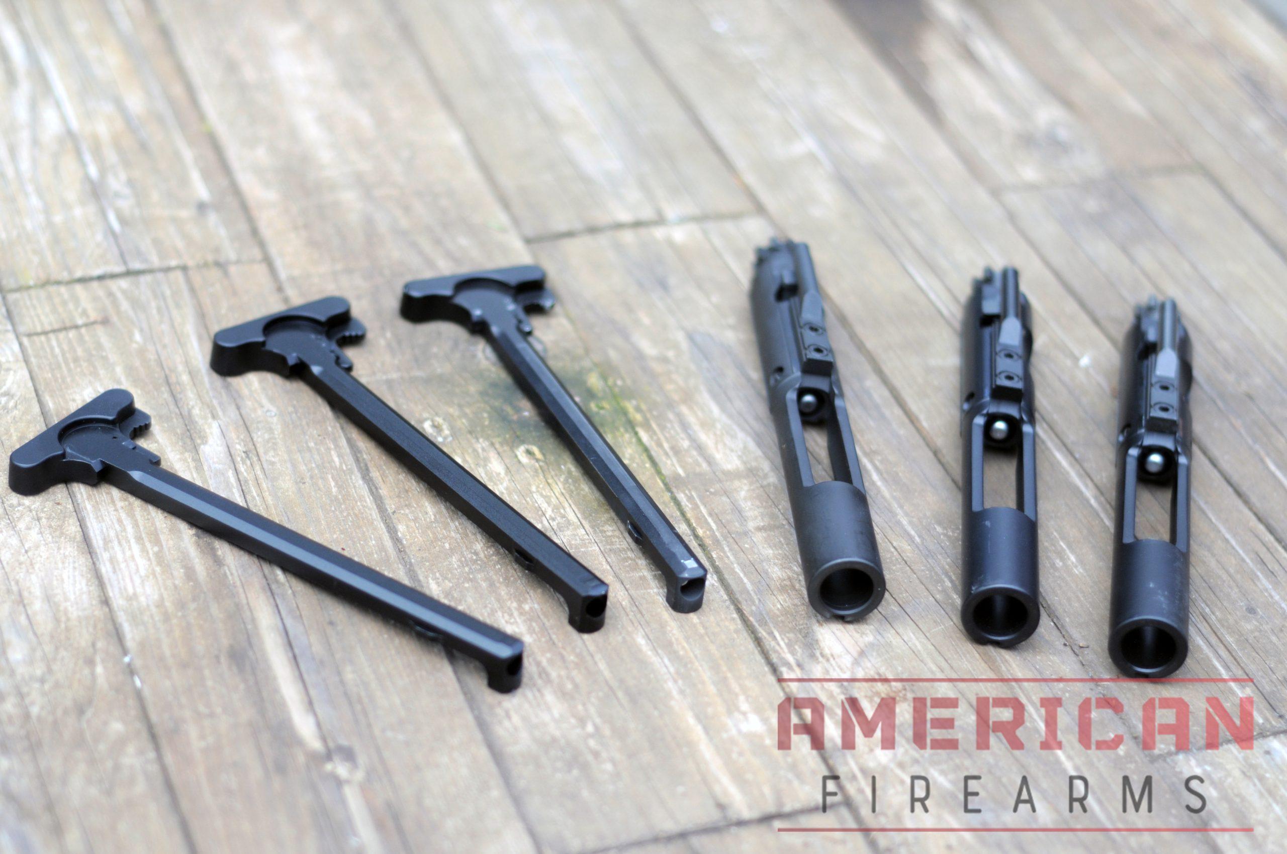 A mil-spec parade of charging handles and BCGs