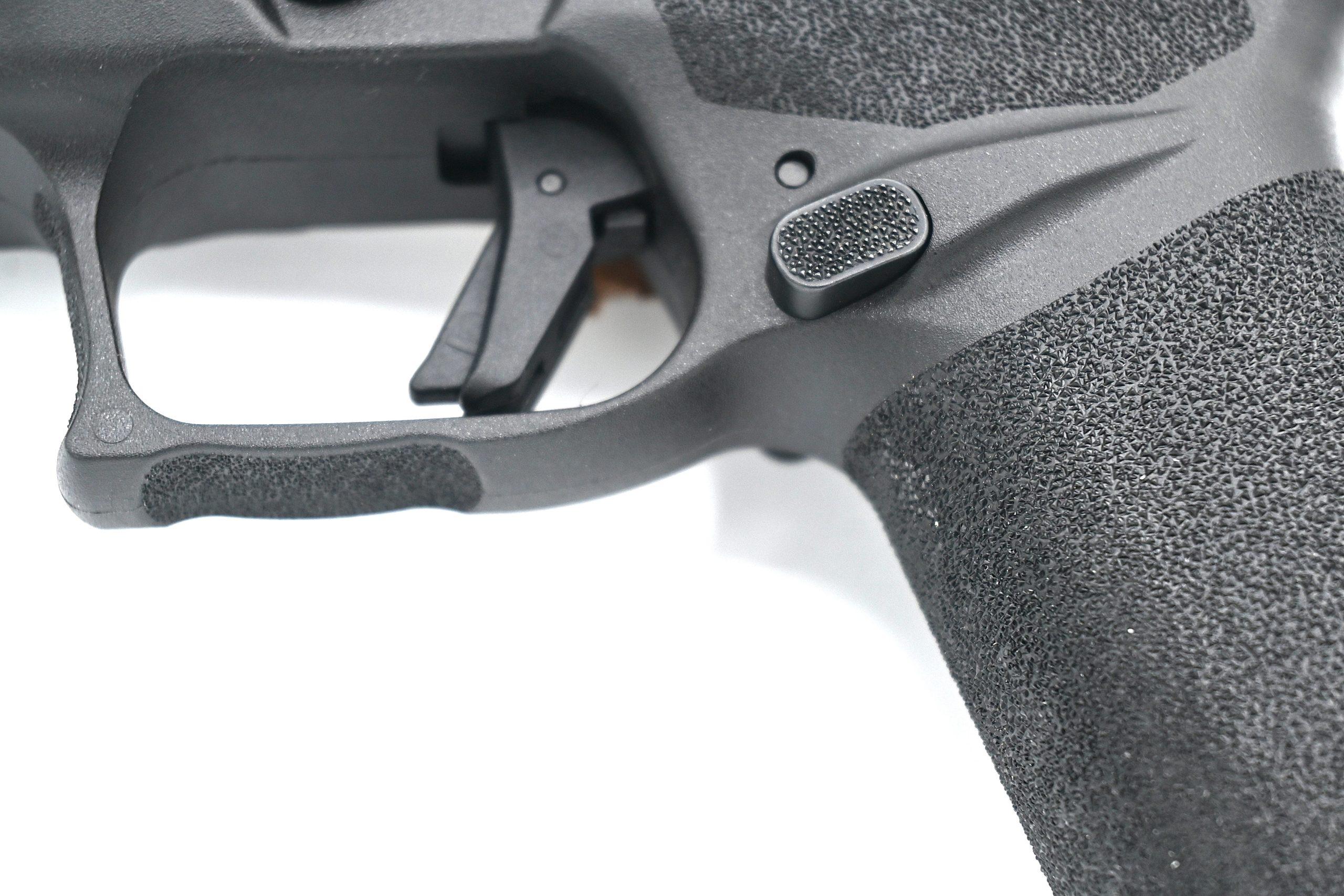 The Echelon's curved trigger face with centered blade safety. Our Wheeler gauge averaged 5.75 lbs across twenty pulls — lighter and more consistent than the stock Glock 19 or SIG P320.