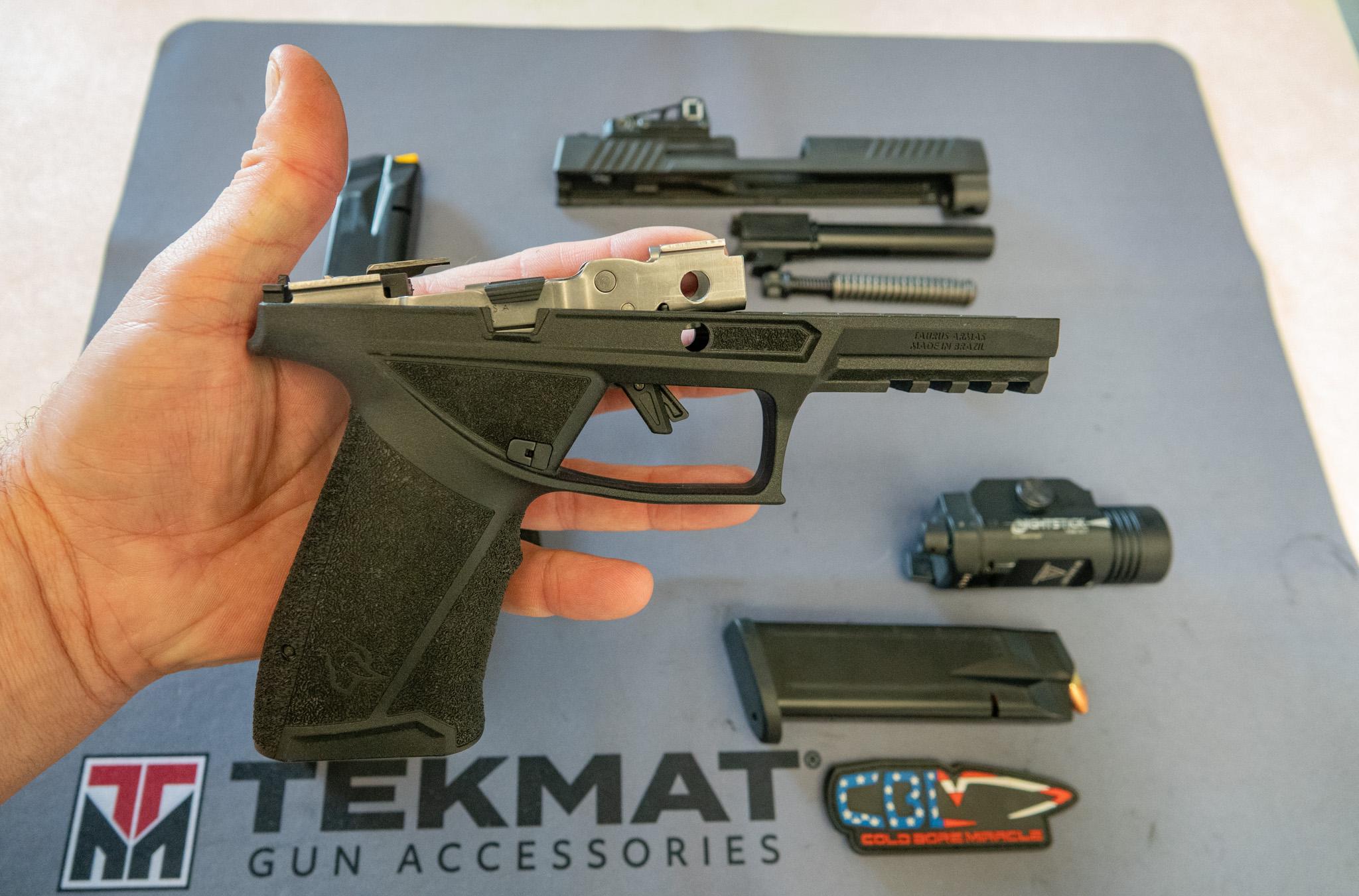 The serialized fire control pack is what moves between grip frames. It's the DNA of the modular system (and where Taurus spent engineering budget that competitors skip.)