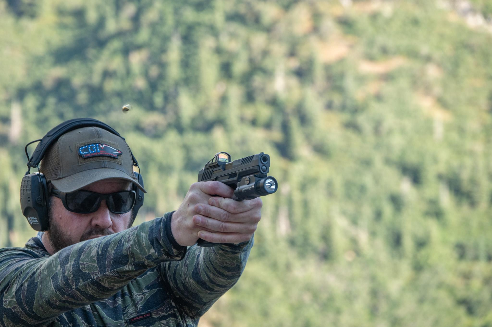 Putting in five-shot group at 7 yards. The TX9's ergonomics and low recoil impulse make shooting it feel effortless—like the gun's doing half the work.