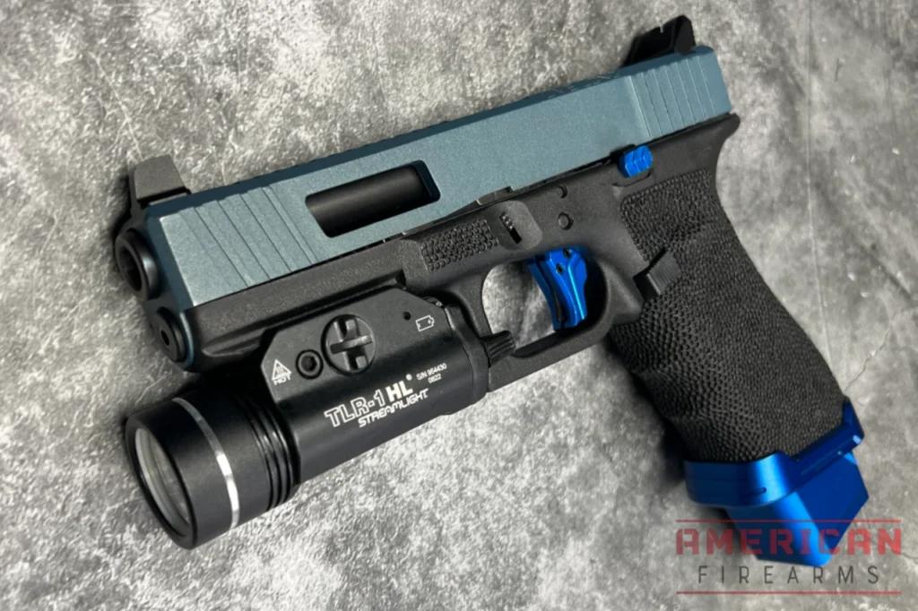 The TLR-1 does extend a touch past the muzzle on most pistols.