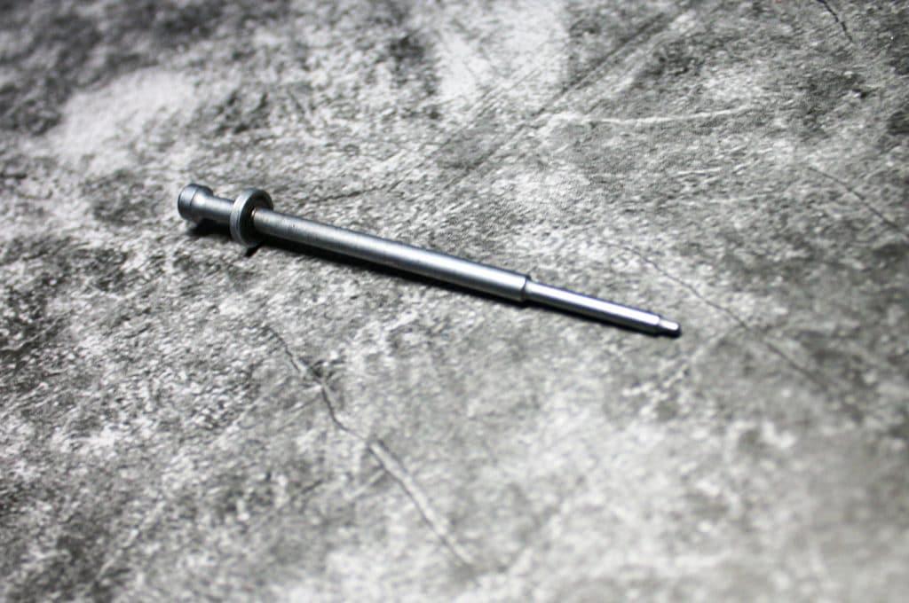 The firing pin. You can't strike a primer without one.
