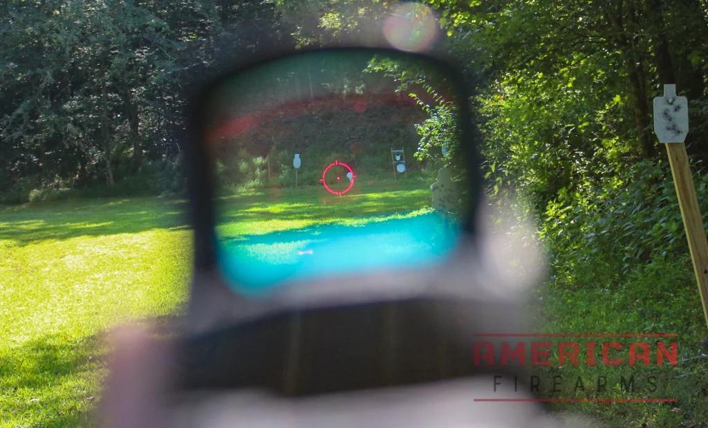 The Holosun 510c at 100 yards. A typical human body will fill the ring at this distance. Here you can see the 2 MOA dot, 65 MOA ring and 4 lines for hold  adjustment.