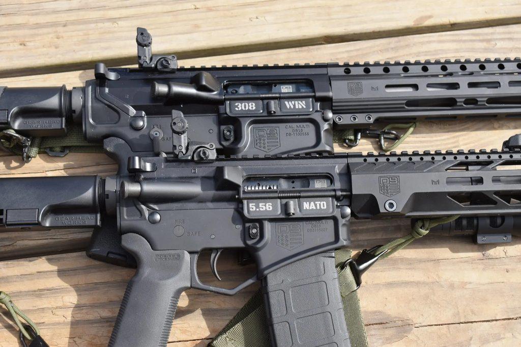 Comparing AR-15 and AR-10 -- both of which are outfitted with a flat-top A4 upper.