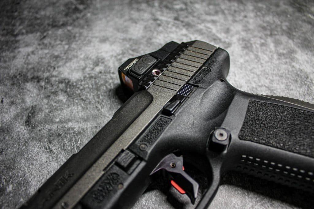 The serrated slide gives you additional traction for speedy reloads.