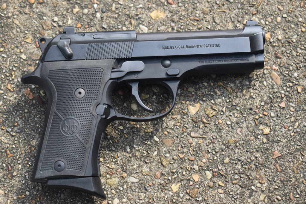 The Beretta 92X -- with its external hammer and steel sights -- in the wild