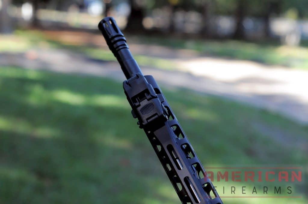 I really appreciated the classic look and feel of the A2 birdcage & nitride-coated, chrome moly vanadium barrel. The 1/7 twist is just right too. Who doesn't love the classic front sight paired with the M4 cutout? You know, in case you need to mount an M203 grenade launcher.