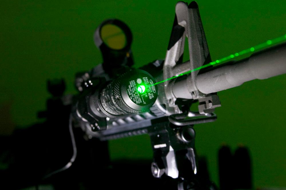 A side-mounted green laser is easy to see and can make the controls easy to reach.