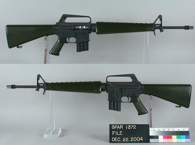 The standard Colt AR15 M01 gas-operated, select fire, assault rifle with OD green furniture.