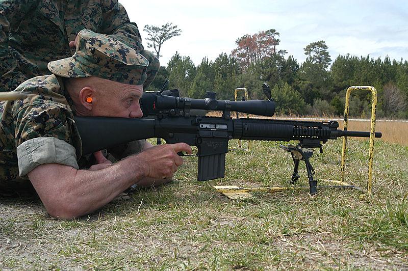 Maj. Gen. Douglas V. O'Dell shoots a 7.62mm KAC (Knight's Armament Company) SR-25 sniper rifle.