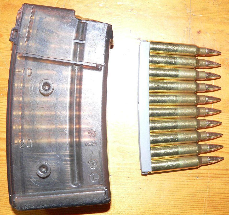 A side-by-side view of a magazine and a stripper clip. The stripper clip is used to speed feeding  cartridges into the magazine.