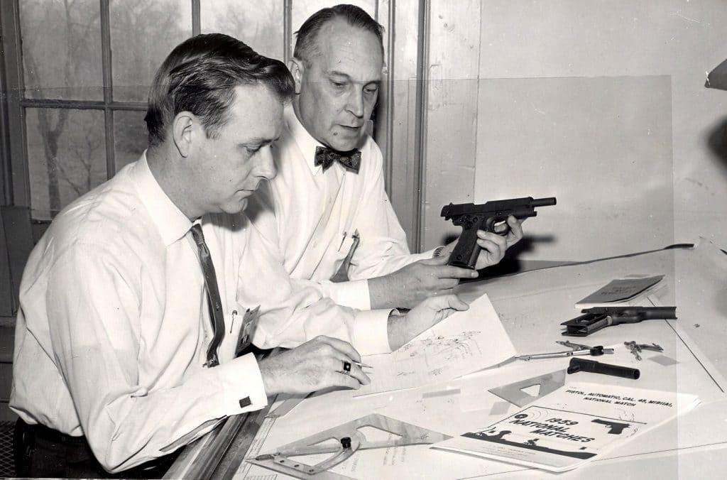 Army National Match program supervisors at work on improving the pistol. (Photo via Springfield Armory National Historic Site)