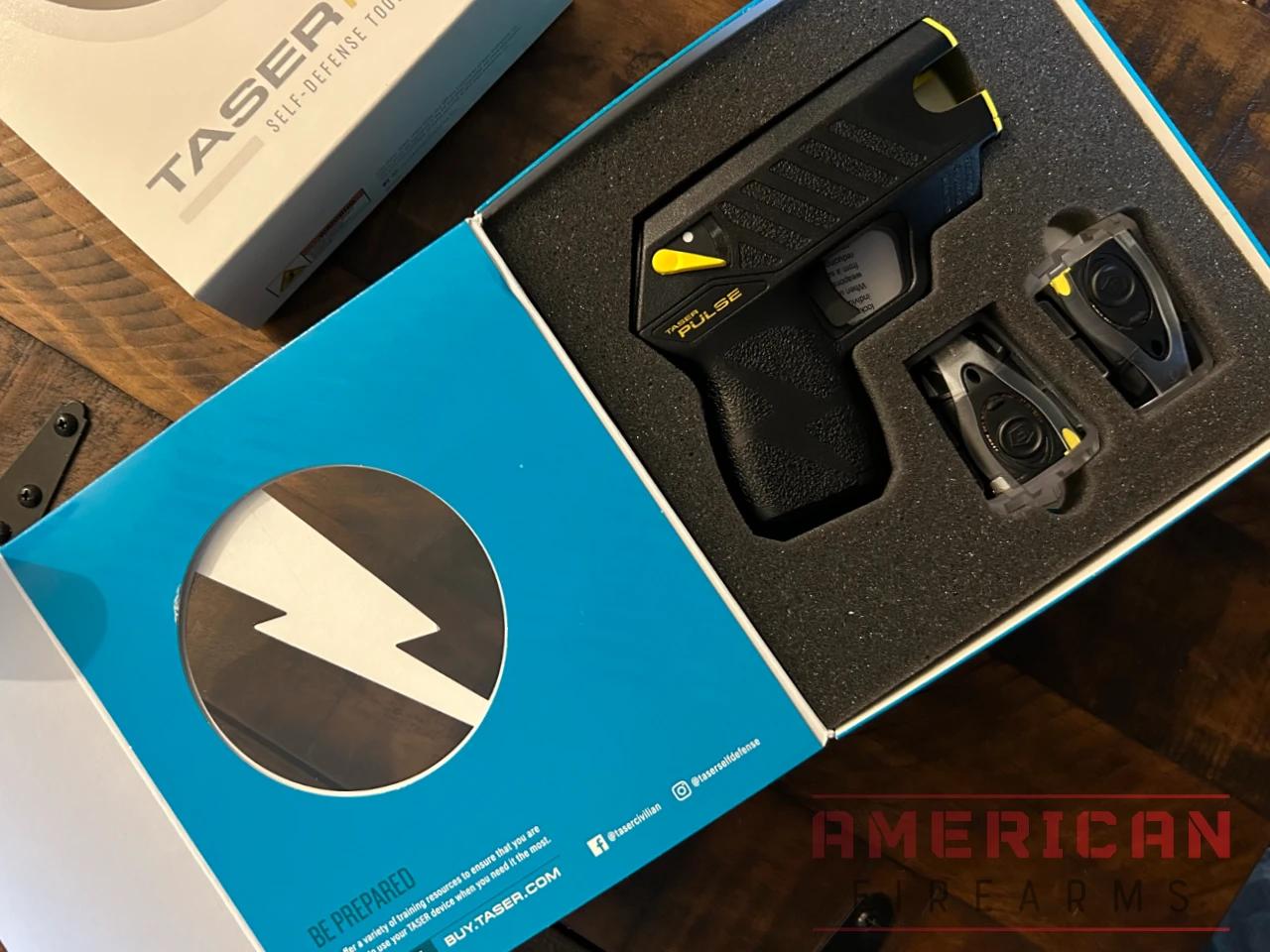 The TASER Pulse, dart cartridges, and packaging.