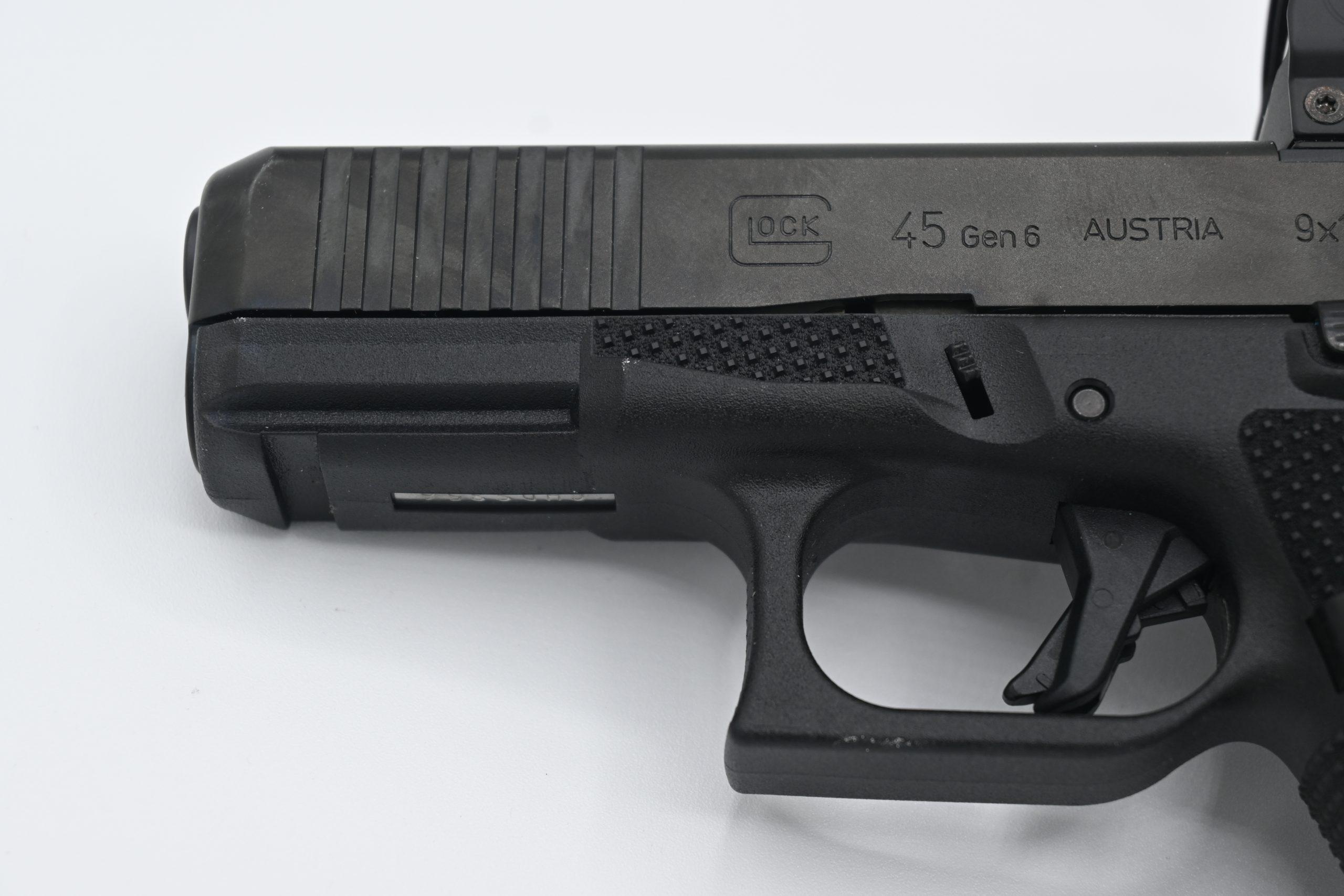 The Gen 6's integrated thumb ledges — visible here in front of the takedown lever — provide the kind of forward purchase that competition shooters have been adding via aftermarket "gas pedal" components for decades.